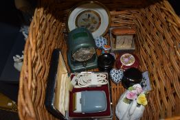 A selection of ceramic pill style cases and a Castell pencil sharpener in wicker basket