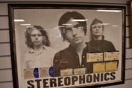 A concert music poster for the Stereophonics with tickets and stubbs framed and glazed
