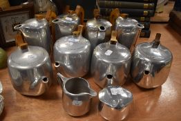 A fine selection of Picquot ware four tea pots and four coffee pots also cream and sugar bowl