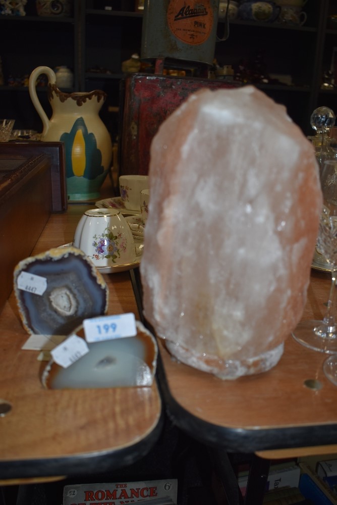 A large Himalayan salt rock and two gem stones/geodes.