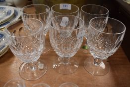 Six Waterford crystal wine goblets.