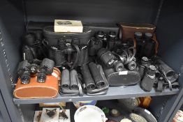 Ten pairs of binoculars and a set of pocket binoculars including Pathescope Regent Yashica Ellgee