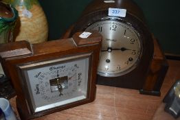 An oak and mahogany cased mantle clock retailed by R Gilbert and sons Barrow in Furness and