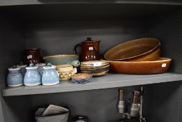 A selection of bake and kitchen wares including Denby and meat platters