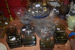 A selection of glass ware including fine cut and etched bowls and saucers also smoked art glass