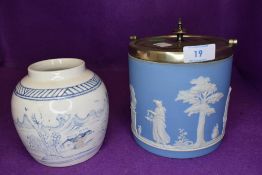 A biscuit barrel by Wedgwood in a light blue Jasper ware and a Chinese style ginger jar