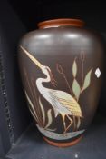 A sawa klinker styled floor vase standing 37cm tall decorated with stalk and pond life