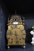 An antique lantern clock standing 36cm tall approx name Richard Washington of Kendall / Kendal