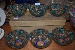 Three arts and crafts Rennie Mackintosh styled enamel glass bowls having blue borders with floral