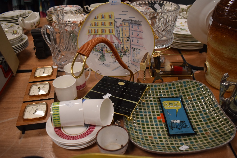 A selection of vintage kitsch and retro kitchen items including mosaic bowl, fruit stand and