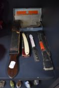 A selection of gentleman's razors and shaving equipment including cut throat and strop etc