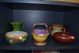 A selection of ceramics including Majolica fruit basket and art deco water jugs