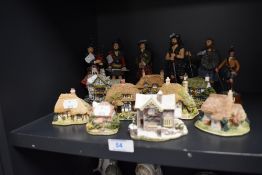 Nine Lilliput lane model houses and six similar Sculptures figures of highlanders