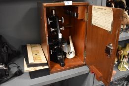 An early 20th century scientist microscope by Watsons in case and good selection of natural