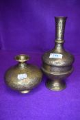 Two pieces of antique middle eastern brass ware having chased Islamic designs