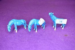 Three blue glaze Chinese wild horse figures each approx 6cm tall