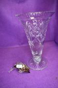 A large clear cut crystal vase of slender form 30cm tall and a similar art glass dolphin figure
