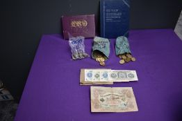 A collection of GB Brass Threepences, loose and in folder including 1946, 1949 and 1951 along with a