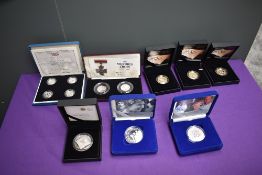 A collection of cased UK Royal Mint Silver Proof Coins comprising, 2006 80th Birthday Crown, 2004-