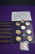 A modern collectable 8 coin set, In Memory of Diana with certificate along with two similar coins