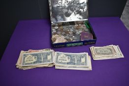 A collection of World Coins and Banknotes including WW2 Japanese Government notes, WW2 Italy Milita