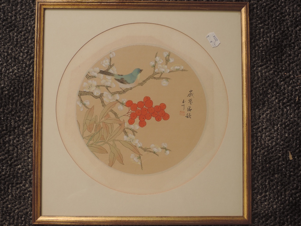 A silk fabric painting, circular, Oriental bird amidst foliage, 30cm dia, plus frame and glazed