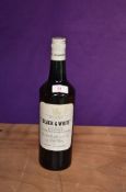 A bottle of Black & White Buchanan's Choice Old Scotch Whisky having screw top, numbered 1193, no