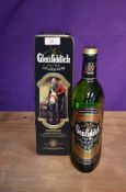 A bottle of Glenfiddich Single Malt Scotch Whisky 70cl 40% vol in presentation tin Clans of the