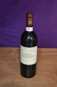 A bottle of Chateau Margaux 1992, Premier Grand Cru Classe 12.5% vol 75cl, laid flat and stored in