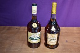 A bottle of Cognac Bisquit Classique, 100cl 40% vol and a bottle of Traveller's Choice Three Barrels