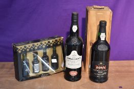 Two bottles of Port, Dows 1994 bottled in 1999, 75cl 20% vol in wooden case and Graham's 1996 75cl