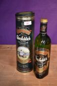 A bottle of 1980's Glenfiddich Single Malt Scotch Whisky 75cl 40% vol in presentation tin