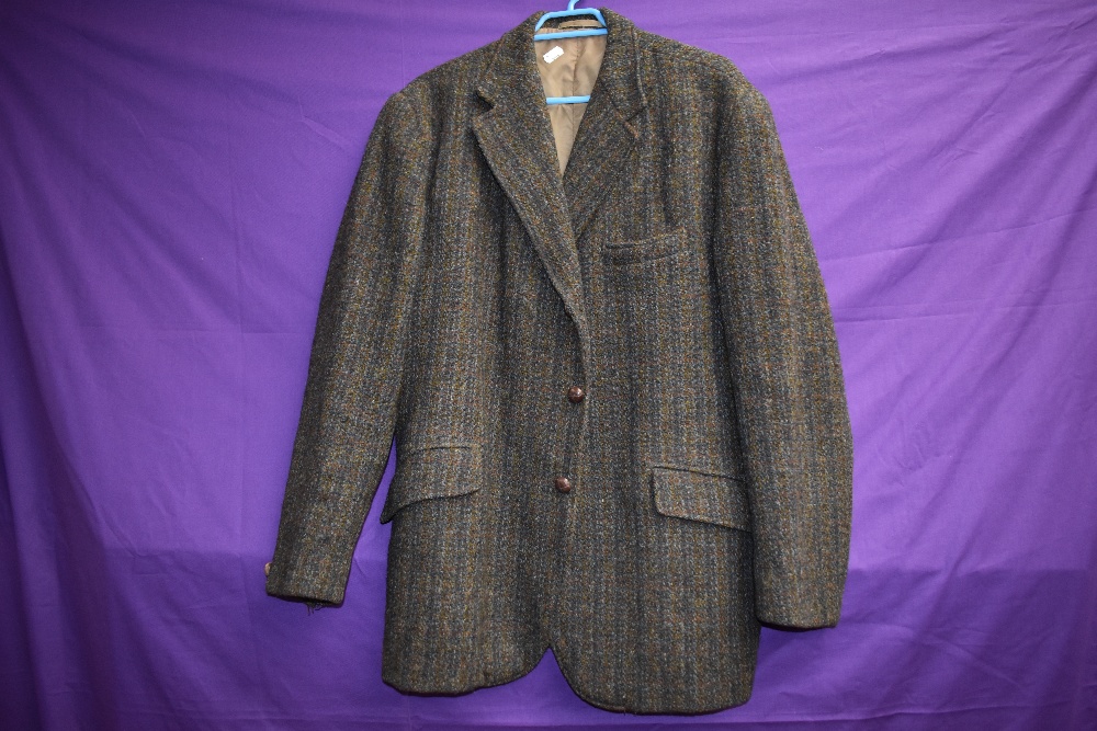 A 1970s gents Harris tweed jacket,AF, sleeve linings removed.