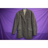 A 1970s gents Harris tweed jacket,AF, sleeve linings removed.