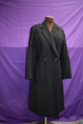 A black 1940s slim fit model coat having wonderful details throughout.AF.