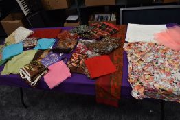 A mixture of vintage headscarves, various styles and colours,fabrics and eras.