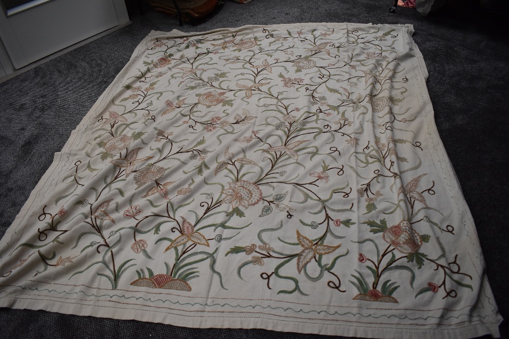 A vintage Indian crewel work embroidered throw.
