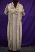 A 1930s striped silk day dress having belt and vents to front and back of skirt, no fastening,