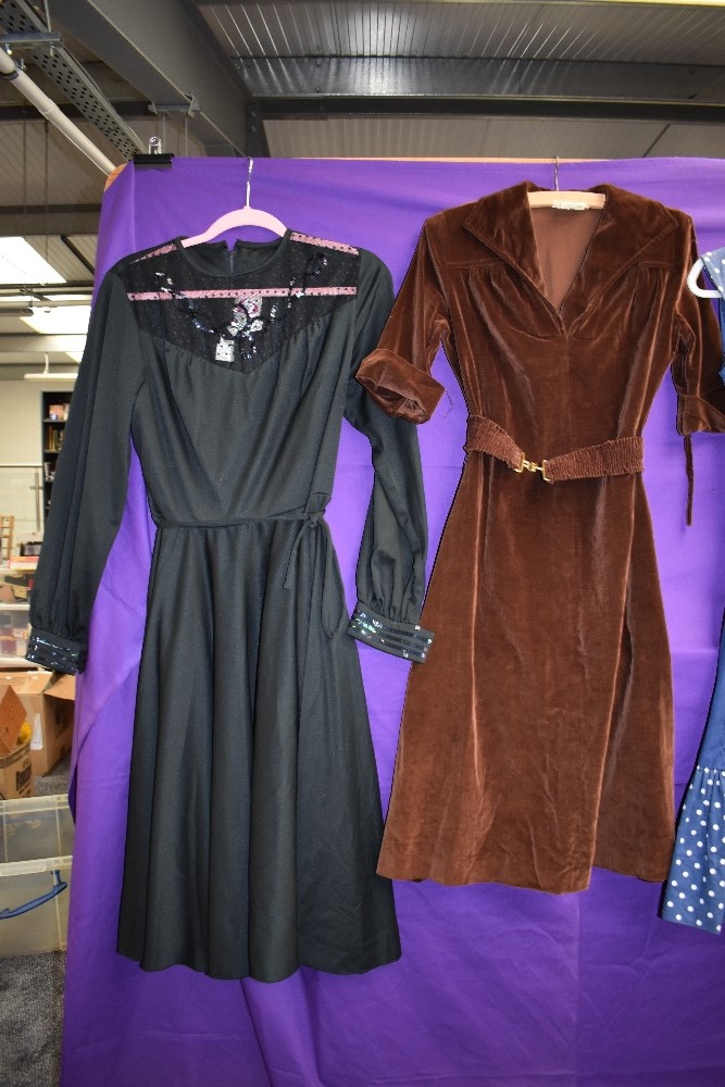 Four vintage dresses including blue 1950s with polka dot accents and 1970s brown velvet with belt. - Image 3 of 4