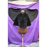Two Victorian capes one in fine black wool with beading, the other of black velvet,beading loose