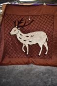 A vintage brown candlewick throw having deer to centre and fringing to edges 'Meghalaya products,