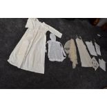 A mixed lot of vintage and antique underwear, aprons and more also included is a Victorian