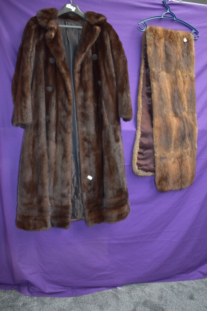 A vintage brown mink coat and a wrap.