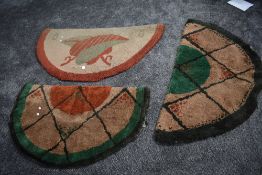 Three vintage half moon wool hearth rugs.