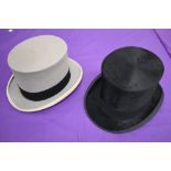 A vintage Harrods top hat and a later grey top hat.