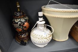 A mid century studio pottery lamp by Iden Rye Sussex and a similar Chinese lamp base