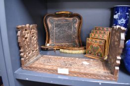 A middle eastern style book shelf and a decoupage crumb tray and similar