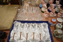 A selection of crystal glass wares including Edinburgh tumblers and hand blown etched water jug