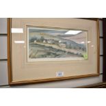 A framed and signed print of a farm at dusk