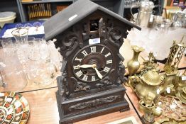 A Victorian cuckoo clock having a Black Forrest style gothic design